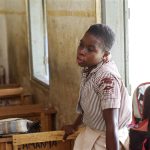 students asking questions in a classroom
