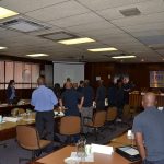 Business leaders meeting around a boardroom table