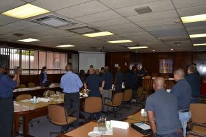 Business leaders meeting around a boardroom table