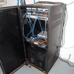 network cables in a blue-lit server room